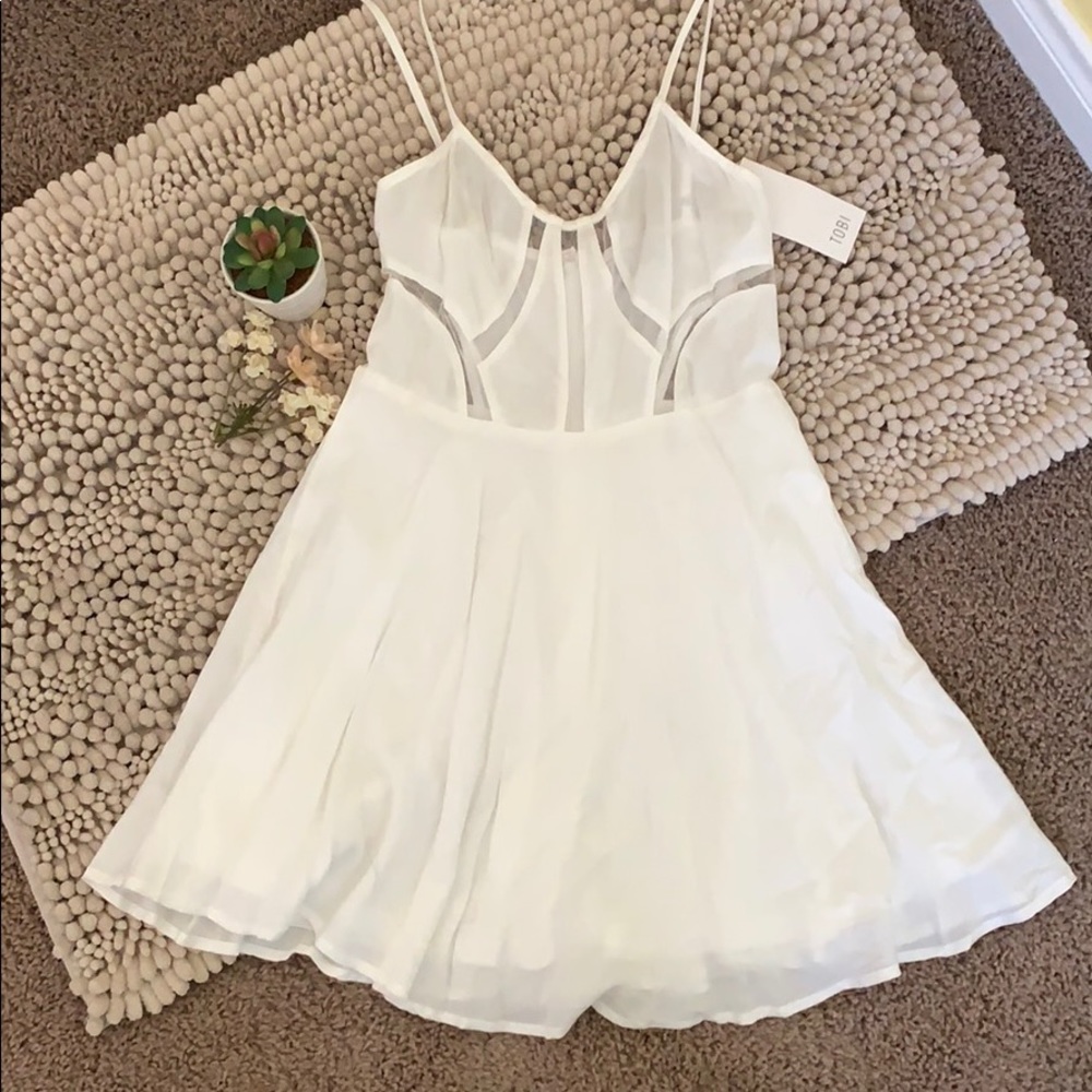 Brand New with tags size sm white Tobi dress